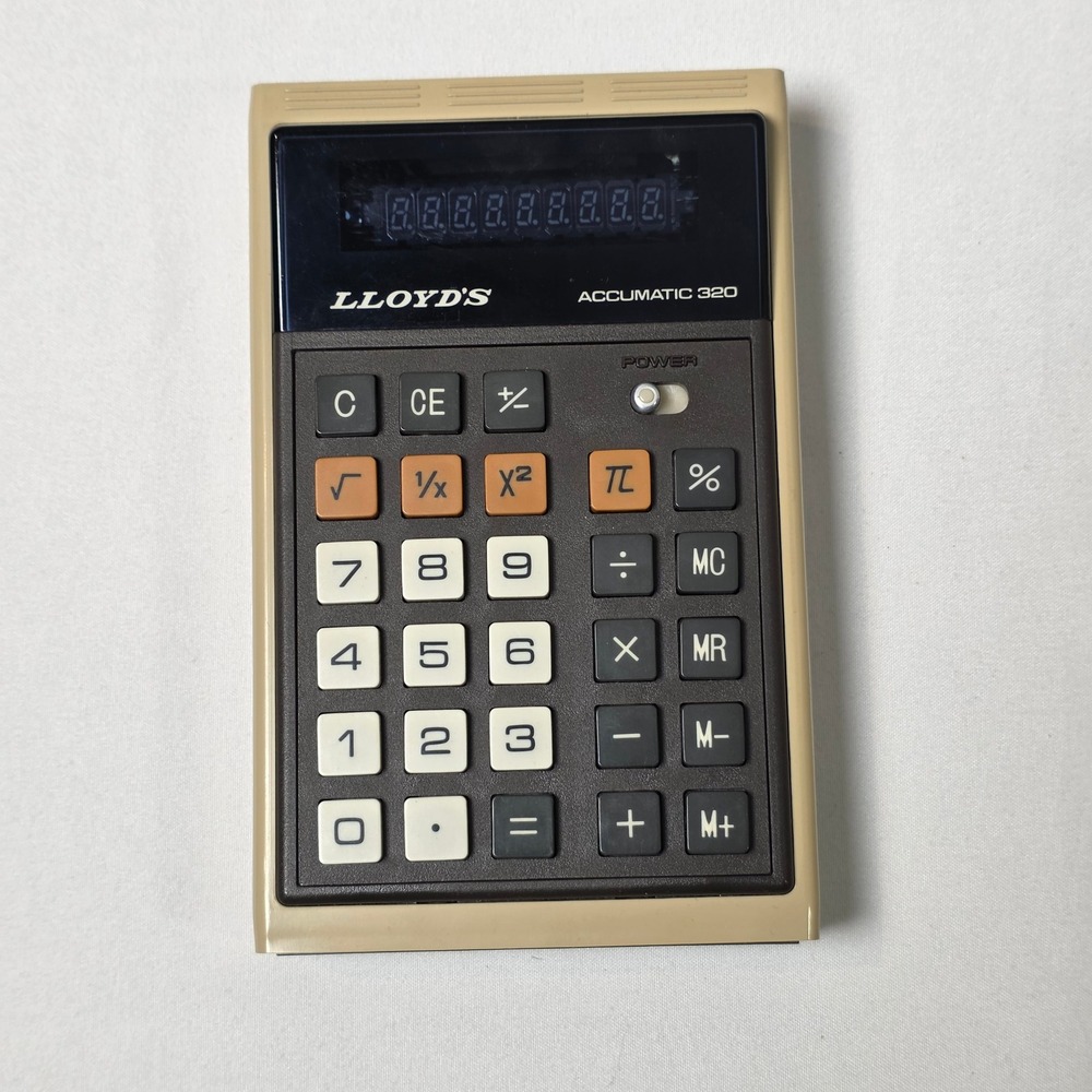 Lloyd's Accumatic 320 Calculator Tan Brown Vintage VFD‎ Model E320 Japan Tested